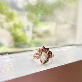 Salt and pepper ring sitting on a window.